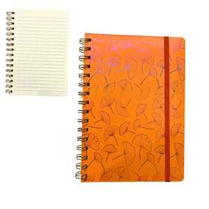 Un Cahier A5 en Spirale avec Lignes .motif Orange Fluo