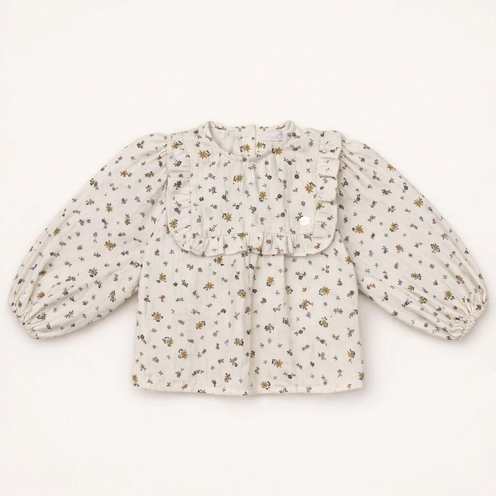 Blouse Bébé Écrue À Fleurs Avec Col Volanté – Élégance Naturelle & Douceur