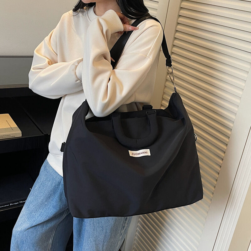 Sac de voyage en toile avec fermeture éclair et multiples sangles