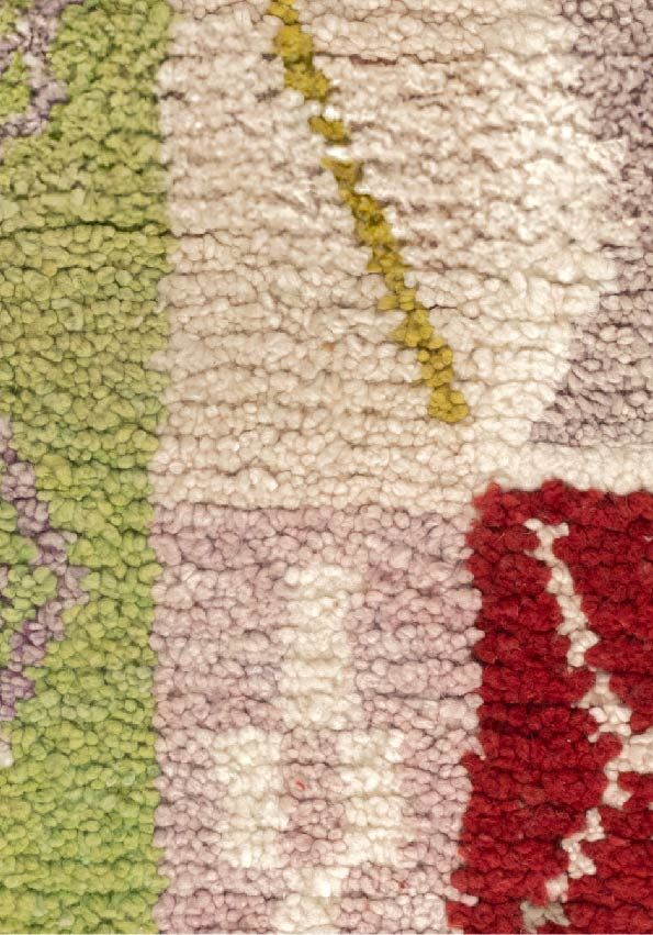 Tapis marocain à motifs de diamants aux douces couleurs pastel