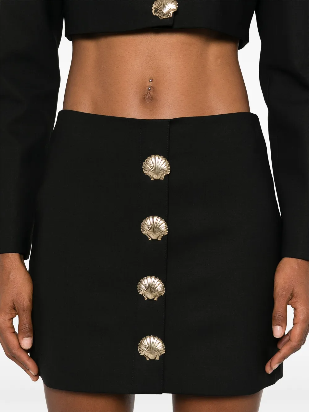 mini skirt with sea shell pin detailing