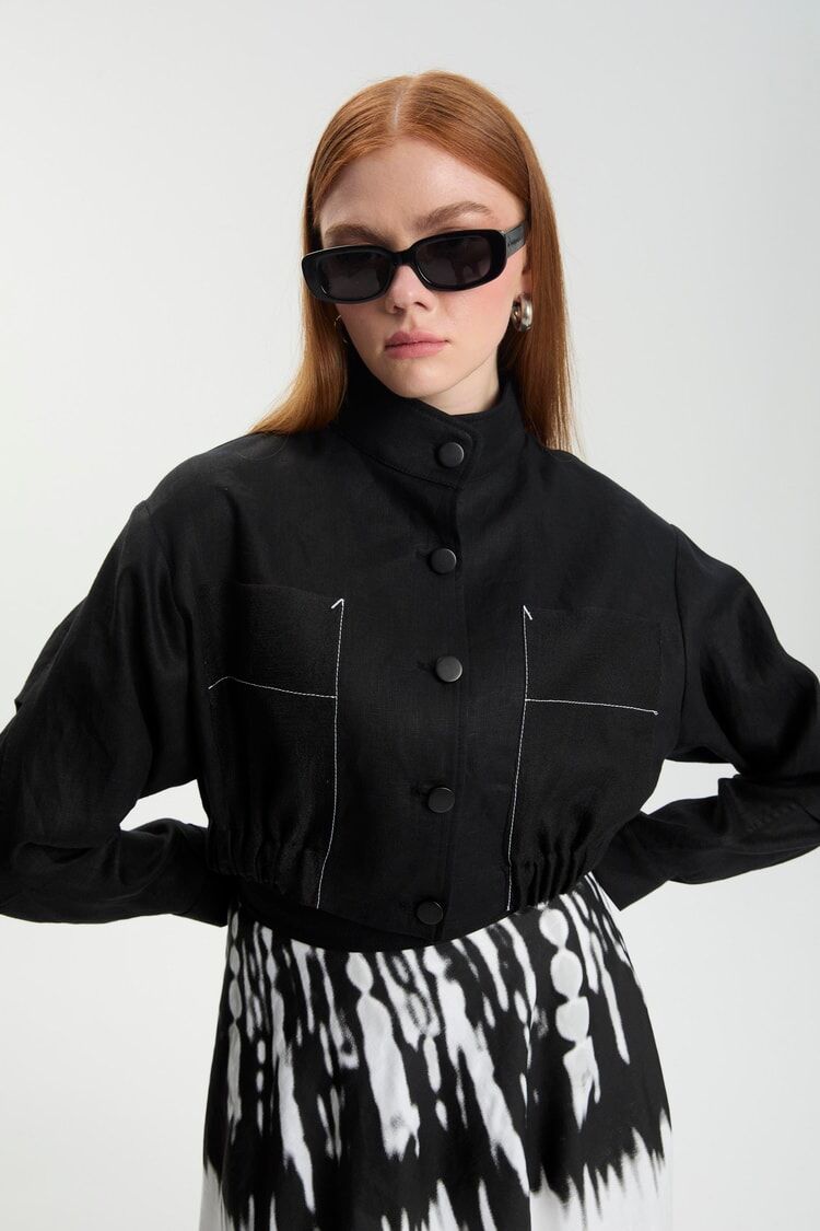 Jupe à motifs et veste deux pièces